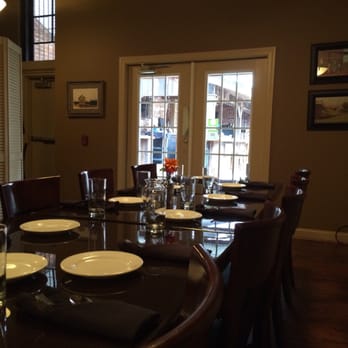 Golden Leaf Bistro - Large table leading to outdoor seating area - Bars Near Me - Danville, Virginia