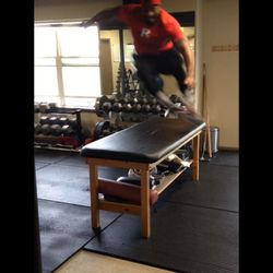 Andrew Phelka, Personal Fitness Consultant - Plyo-jumps over a 30x30 table!