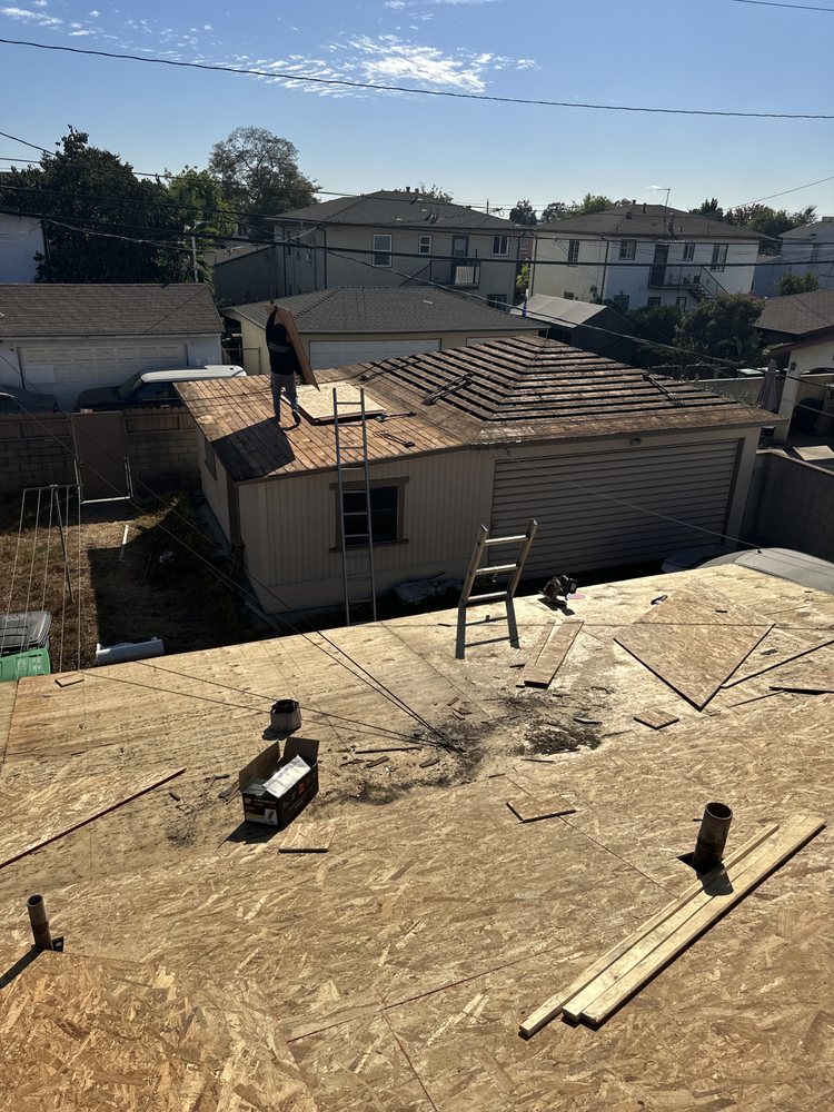 Slide of T’S Roofing