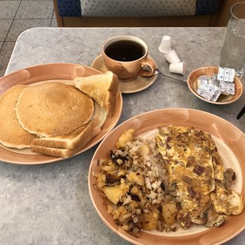 Orem's Diner - Short stack w/ maple syrup, Corned beef omelette w/mushrooms and home potatoes w/onions! - Diners Near Me - Wilton, Connecticut
