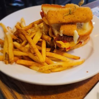 TGI Fridays Conway - a plate of french fries and a sandwich - Burgers Near Me - Conway, Arkansas TGI Fridays Conway - a plate of french fries and a sandwich - Burgers Near Me - Conway, Arkansas
