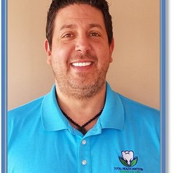 Total Health Dentistry - Dr Dominic Sabatini - sees clients primarily in State College office, is an expert in Implant Dentistry