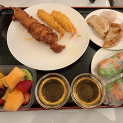 Asia Express - Tempura shrimp, spring rolls, steamed pork dumplings, shrimp buns, chicken skewer.
