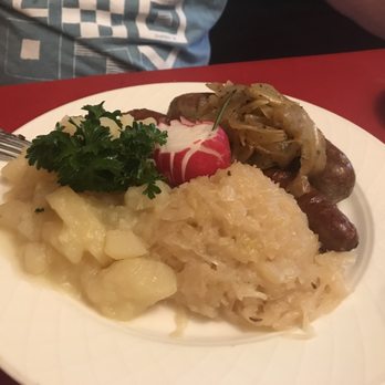 Old Europe - Sausage sampler platter with German potato salad and sauerkraut. - German Near Me - Washington, DC, District of Columbia