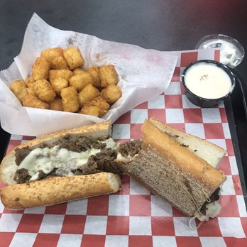 Johnny Longhots Steaks - Philly w/o and provolone, old bay tots! - Sandwiches Near Me - Hainesport, New Jersey Johnny Longhots Steaks - Philly w/o and provolone, old bay tots! - Sandwiches Near Me - Hainesport, New Jersey
