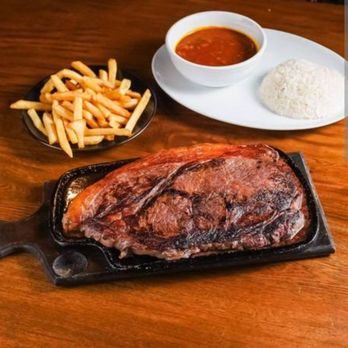 Oh Que Bueno Restaurant - Semoran - Steak with fries and rice and beans - Sports Bars Near Me - Orlando, Florida Oh Que Bueno Restaurant - Semoran - Steak with fries and rice and beans - Sports Bars Near Me - Orlando, Florida