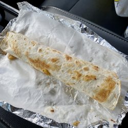 Taquerias cervantez - Breakfast burrito, snack for the price, but good.