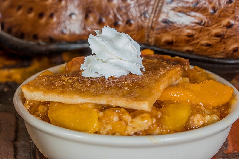 Order Peach Cobbler food online from Valley Ranch Grill & Barbecue store, Houston on bringmethat.com