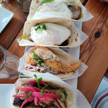 Salty Sow - Two pork belly tacos, catfish taco, pork carnitas taco! - American Near Me - Austin, Texas