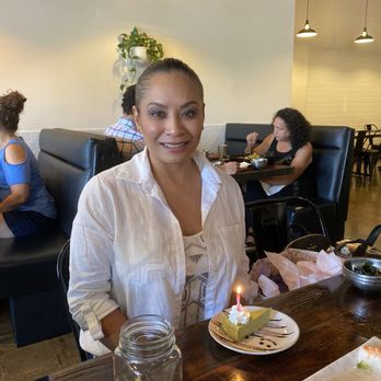 Mikko Sushi - The birthday girl with her free Green tea cake. - Sushi Bars Near Me - Vista, California