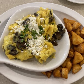 Wild Eggs - Wild Mushroom and Roasted Garlic Scramble - Coffee & Tea Near Me - Bowling Green, Kentucky Wild Eggs - Wild Mushroom and Roasted Garlic Scramble - Coffee & Tea Near Me - Bowling Green, Kentucky