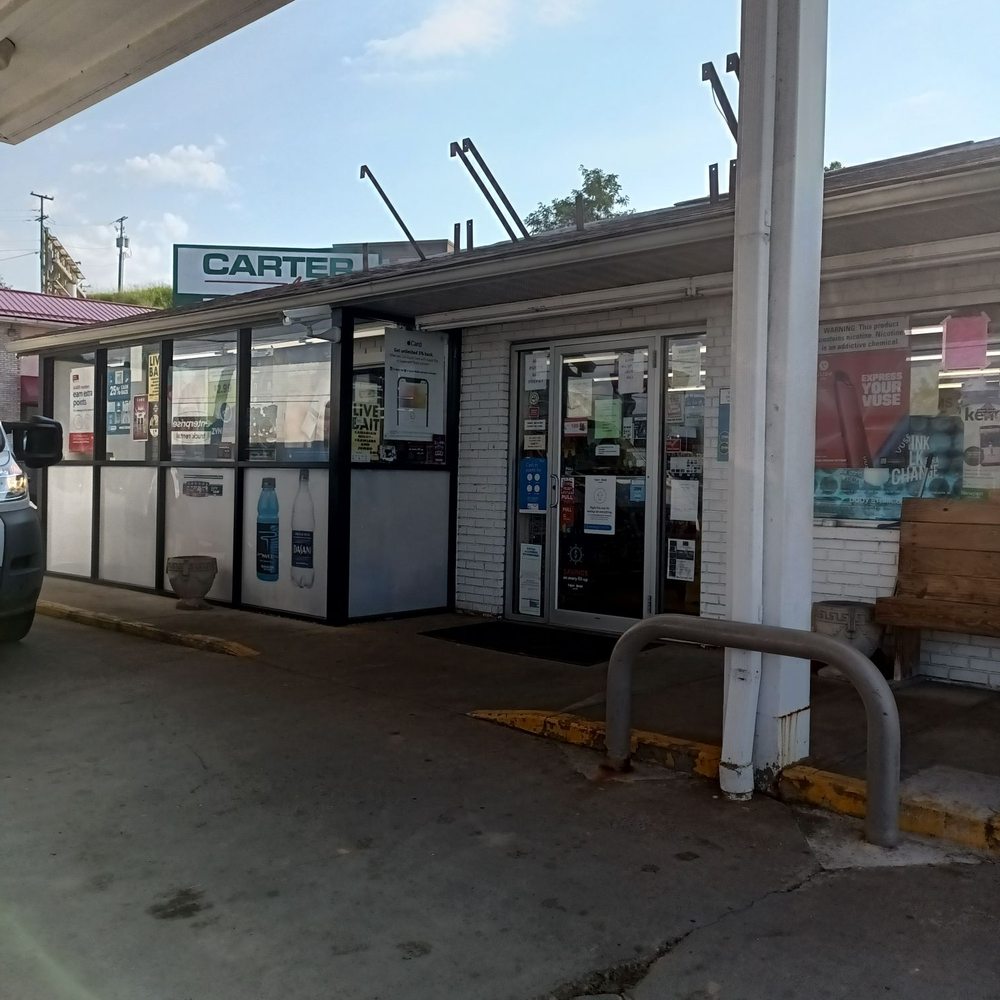 Exxon - a car parked in front of a gas station - Gas Stations Near Me - RIPLEY, West Virginia
