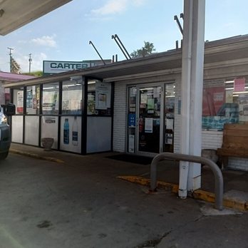 Exxon - a car parked in front of a gas station - Gas Stations Near Me - RIPLEY, West Virginia