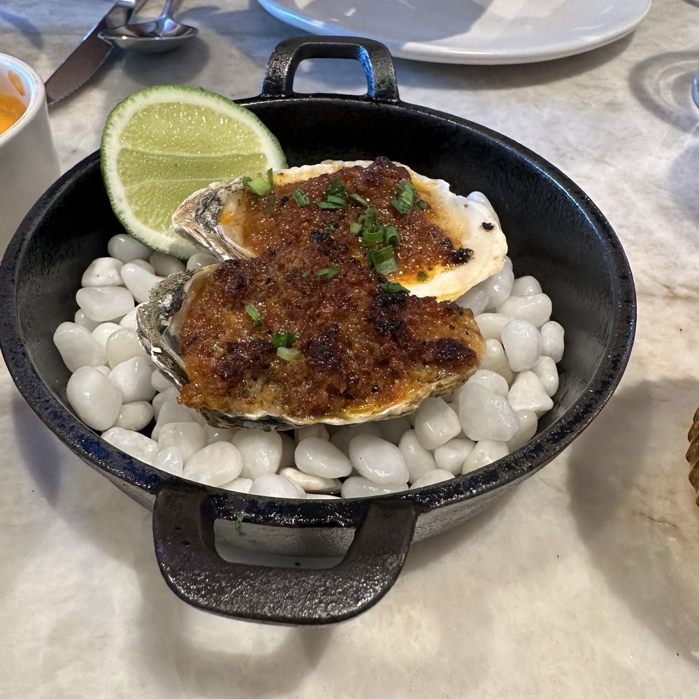 Este - CHORIZO BROILED OYSTER - Seafood Near Me - Austin, Texas Este - CHORIZO BROILED OYSTER - Seafood Near Me - Austin, Texas
