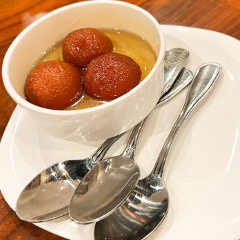 Royal Hyderabad - a bowl of gulaba and spoons - Indian Near Me - Albuquerque, New Mexico