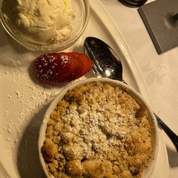 Michael's - Warm apple and berry crumb with vanilla ice cream on the side. - Italian Near Me - Brooklyn, New York Michael's - Warm apple and berry crumb with vanilla ice cream on the side. - Italian Near Me - Brooklyn, New York