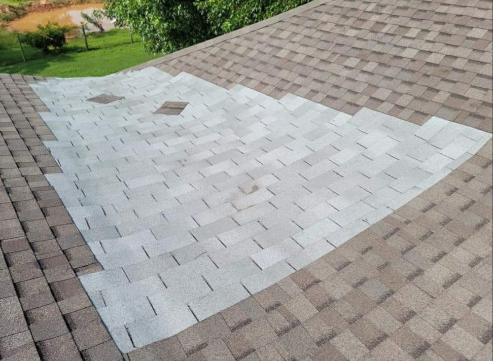 Slide of Acadiana Roofing