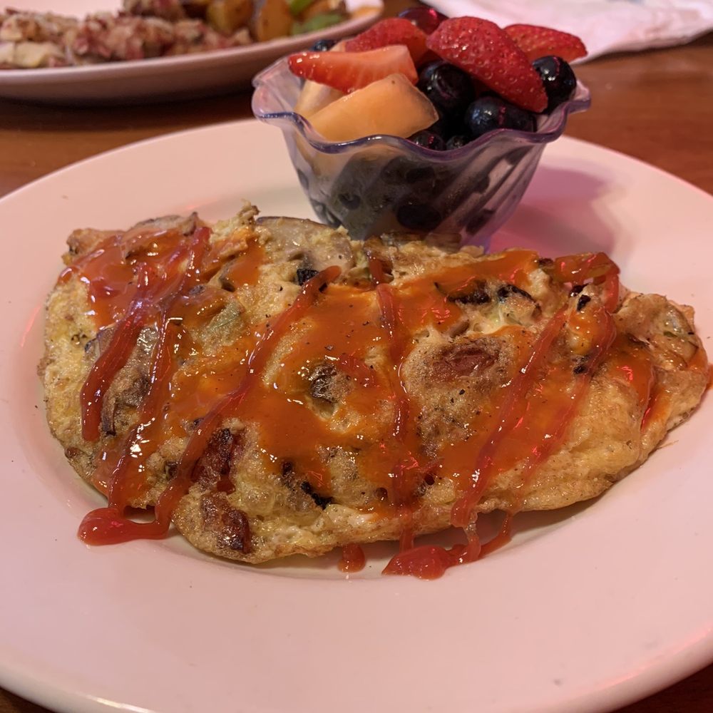 Luxury Diner - Fruit cup with veggie omelette (no olives and cheese) covered in hot sauce - Diners Near Me - Cheyenne, Wyoming Luxury Diner - Fruit cup with veggie omelette (no olives and cheese) covered in hot sauce - Diners Near Me - Cheyenne, Wyoming