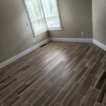 First Call Construction - a hardwood floor in a home - Roofing Near Me First Call Construction - a hardwood floor in a home - Roofing Near Me