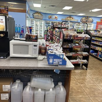 Thrall Food Store - a counter with a microwave - Convenience Stores Near Me - Thrall, Texas Thrall Food Store - a counter with a microwave - Convenience Stores Near Me - Thrall, Texas