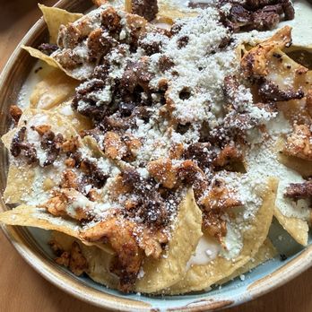 Uno Mas - Nacho Daddy with beef, chicken, queso and cheese on top- no lettuce, pico, corn, jalapeños or house creama. - Beer Bar Near Me - Lynchburg, Virginia Uno Mas - Nacho Daddy with beef, chicken, queso and cheese on top- no lettuce, pico, corn, jalapeños or house creama. - Beer Bar Near Me - Lynchburg, Virginia