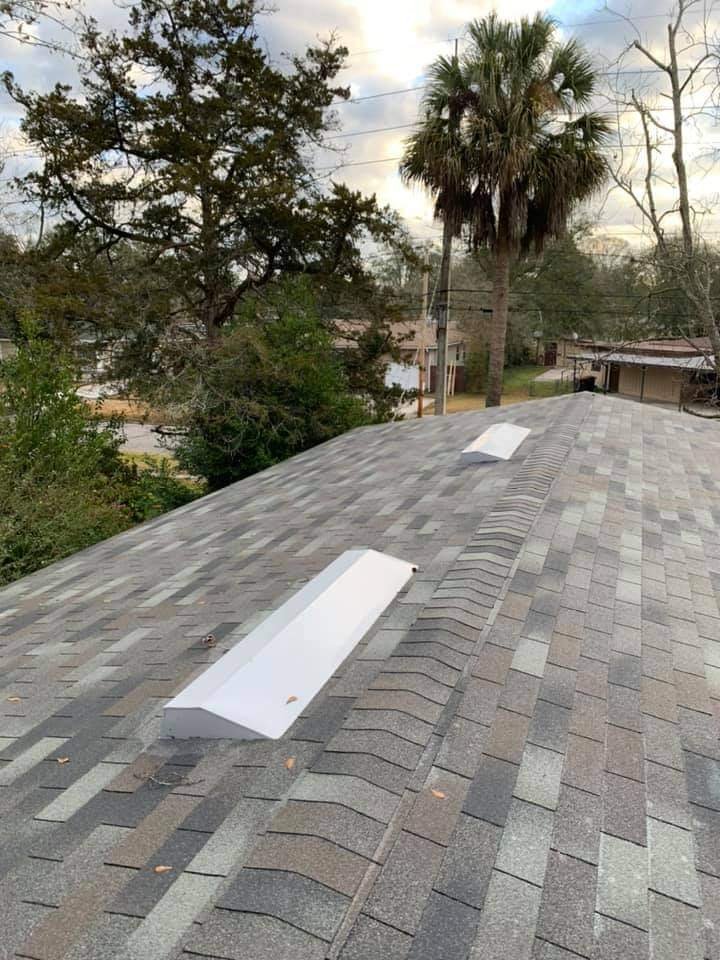 Slide of White's Roofing