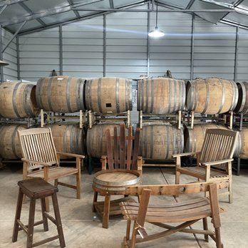 Gale Vineyards - barrels and chairs in a warehouse - Wineries Near Me - Durham, California