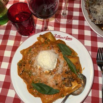 Arthur & Sons - Raviolis with ricotta, peas, and mushrooms topped with vodka sauce - Seafood Near Me - Jupiter, Florida Arthur & Sons - Raviolis with ricotta, peas, and mushrooms topped with vodka sauce - Seafood Near Me - Jupiter, Florida