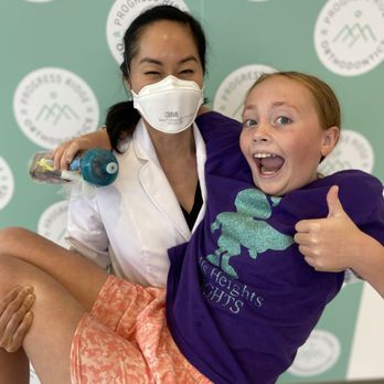 Progress Ridge Orthodontics - Ellie is VERY happy and Dr. Park is VERY strong. (photo credit Ryan Debbin) - Orthodontists Near Me - Beaverton, Oregon Progress Ridge Orthodontics - Ellie is VERY happy and Dr. Park is VERY strong. (photo credit Ryan Debbin) - Orthodontists Near Me - Beaverton, Oregon