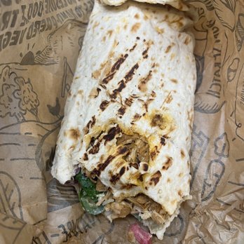 NAYA - a burrito wrapped in brown paper - Lebanese Near Me - Garden City, New York NAYA - a burrito wrapped in brown paper - Lebanese Near Me - Garden City, New York