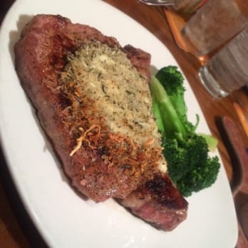 Outback Steakhouse - Porterhouse steak with herb Parmesan crust. - Steakhouses Near Me - Northridge, California Outback Steakhouse - Porterhouse steak with herb Parmesan crust. - Steakhouses Near Me - Northridge, California