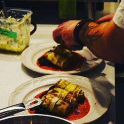 Knife & Nettles Catering - Chef Mike Plating Zucchini Involtini