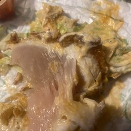 Raw chicken sandwich served