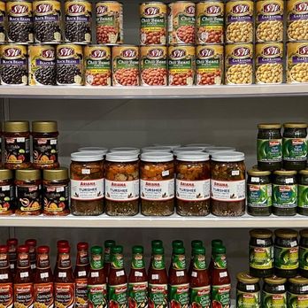 Afshar Bakery - a shelf full of food items - Pizza Near Me - Kent, Washington Afshar Bakery - a shelf full of food items - Pizza Near Me - Kent, Washington