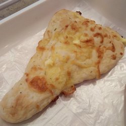 Mr. Park's Bread & Cake - Garlic Naan (traditional Indian flat soft bread with sweet garlic butter topped with cream cheese, mozarella cheese and dried parsley)