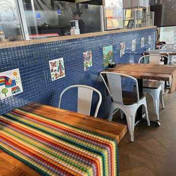 Finca Coffee - Indoor seating area plus view of the kitchen. - Coffee & Tea Near Me - Madison, Wisconsin