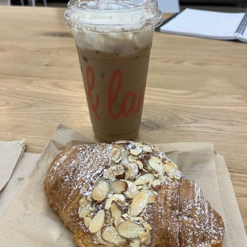Lion and Lamb Coffee Roasters - "Just Peachy" and almond croissant - Coffee & Tea Near Me - Costa Mesa, California Lion and Lamb Coffee Roasters - "Just Peachy" and almond croissant - Coffee & Tea Near Me - Costa Mesa, California