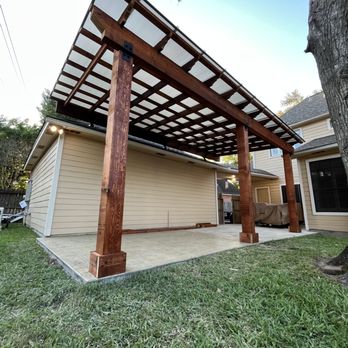 MP Renovations - Stamped concrete addition, cedar pergola with electrical, and polycarbonate system. - Patio Coverings Near Me