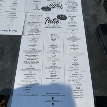 Patio 03907 - Menu - A printed menu from Patio 03907 in Ogunquit, ME, displaying seafood dishes, burgers, sandwiches, appetizers, and sides, with prices and descriptions. - Seafood Near Me - Ogunquit, Maine
