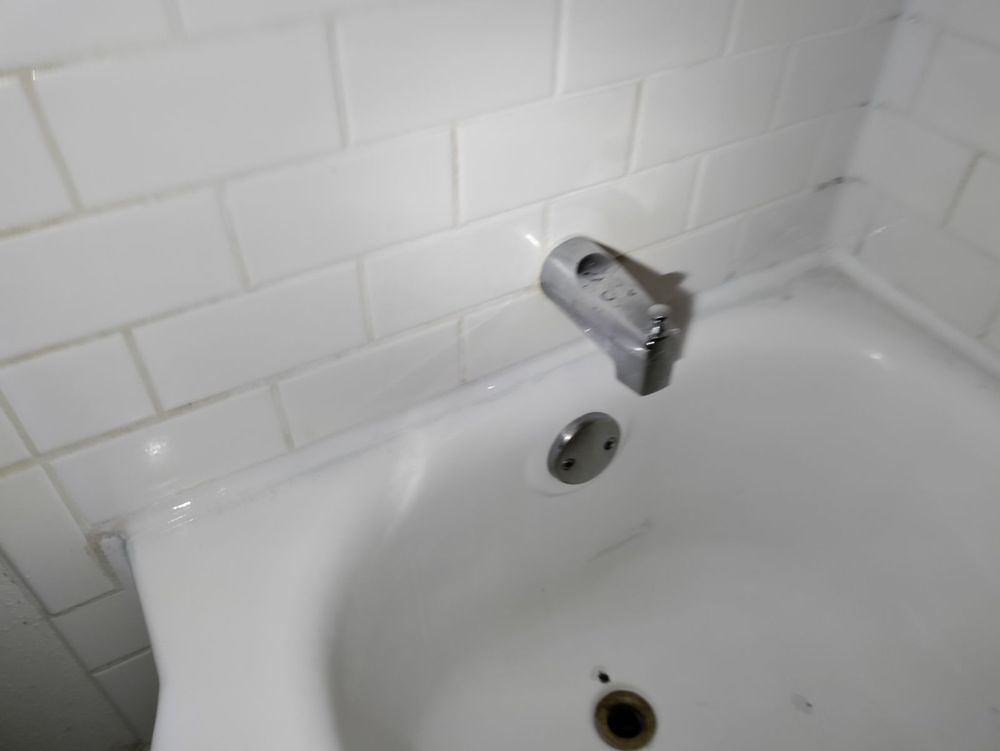 Slide of Pro Bath & Shower Caulking