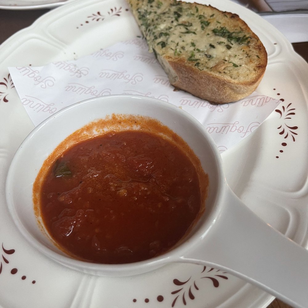 Sfoglina - Downtown - Cheesy house made garlic bread with spicy marinara. - Italian Near Me - Washington, DC, District of Columbia Sfoglina - Downtown - Cheesy house made garlic bread with spicy marinara. - Italian Near Me - Washington, DC, District of Columbia