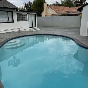 Dec-rative Concrete - a pool in a backyard - Flooring Near Me - Downey, California