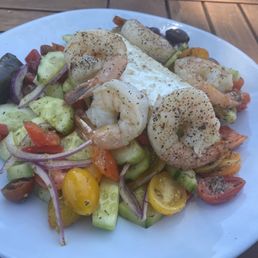 Lunch Greek salad which comes with either grilled shrimp or grilled chicken.