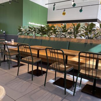 Shake Shack Westbend - tables and chairs in a restaurant - Burgers Near Me - Fort Worth, Texas Shake Shack Westbend - tables and chairs in a restaurant - Burgers Near Me - Fort Worth, Texas