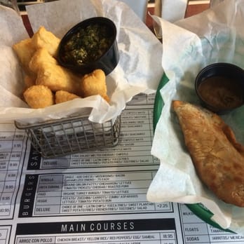 Coppelia - Yucca fries with a chimichurri sauce and sweet corn empanadas - Cuban Near Me - New York, New York Coppelia - Yucca fries with a chimichurri sauce and sweet corn empanadas - Cuban Near Me - New York, New York