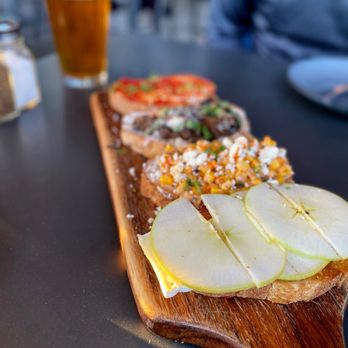 Postino Grant - Oh, that boooooard -- brie, apple, fig / Mexican street corn / mushroom and mascarpone / pepper jam and goat cheese. - Wine Bars Near Me - Tucson, Arizona