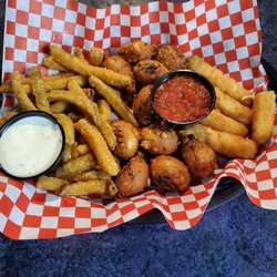 Players & Spectators Events Center - $17 pick 3 appetizer sampler, fried pickles, pretzel bites, and mozzarella sticks.
