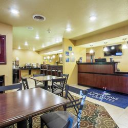 Cobblestone Inn & Suites - Corry - The front desk and breakfast area of the Cobblestone Inn & Suites of Corry, PA.