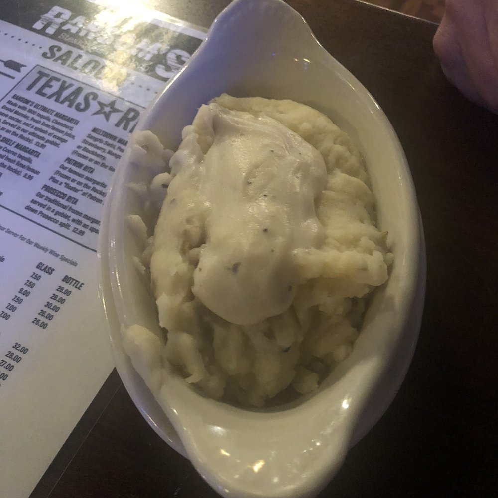Ransom's Steakhouse - Creamy mashed potatoes with cream white gravy - Steakhouses Near Me - Montgomery, Texas