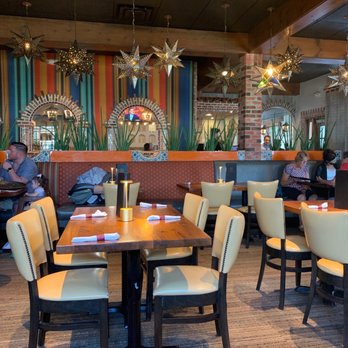 Puerto Vallarta - tables and chairs in a restaurant - Mexican Near Me - Danbury, Connecticut Puerto Vallarta - tables and chairs in a restaurant - Mexican Near Me - Danbury, Connecticut